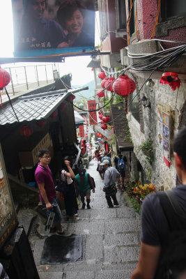 Stairs with colorful lanterns in the village.