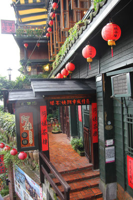 Lanterns hanging from the first floor.