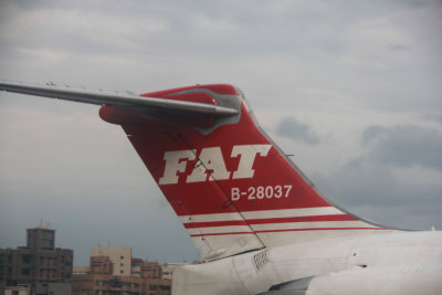 Close-up of the FAT logo on the tail of the plane.