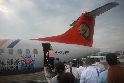 To get to Taroko National Park, we had to fly to Hualien from Tapei. Passengers boarding our TransAsia Airways flight.