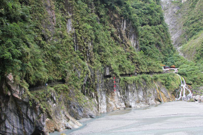 To get to the shrine, you have to walk on a path along the cliff near the base of the gorge.