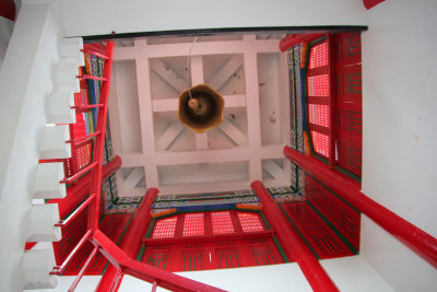 View looking from inside of the tower up at the bell.