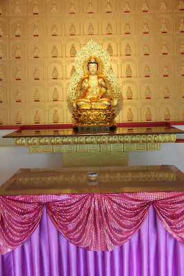 One of the many beautiful golden Buddhist figures in the temple.