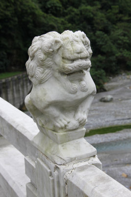 Close-up of one of the lion statues.