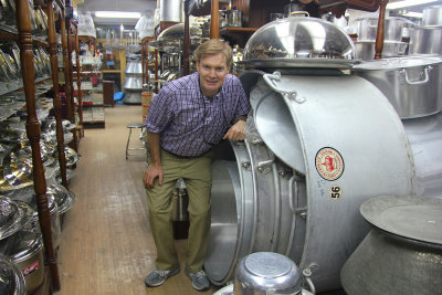 I am dwarfed by the pot. You could cook for hundreds of people in it!
