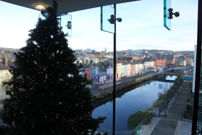 View with a Christmas tree in the foreground.