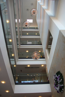 Atrium view showing the five upper floors and a Christmas wreath.