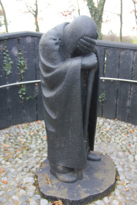 Statue at the entrance of Clonmacnoise of The Pilgrim. It represents Aedh, son of Colcon, Chief of Oriel.