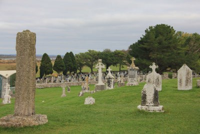 Some of the many gravestones and tall crosses at Clonmacnoise monastery.