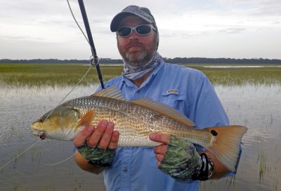 Cary B. with his !st Grass Redfish