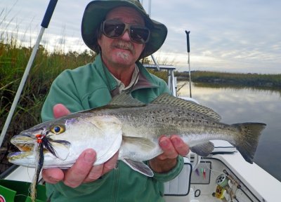 Denny M. from Minnesota with a 4lb. Sea Trout. His 1st of 5 Trout for the day ever caught.