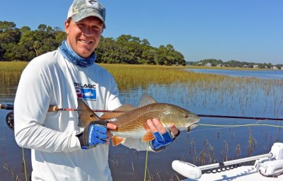 Davis L. from Jacksonville with a nice grass Redfish he caught