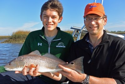 12/29/14-Great father & son day of catching 6 Redfish on spin gear