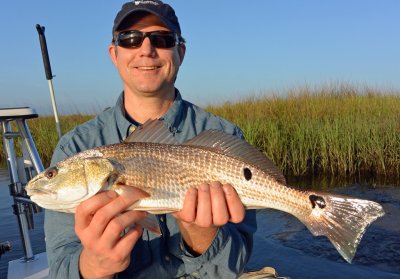 Jay S. with his 1st Redfish