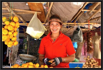 The Smile of the Fruits Vendor. Vientiane Fresh Market.