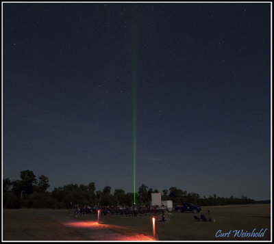 Laser light points to star Vega as park staff offer lunar and star programs free to public.