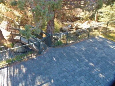 Lower patio on side with water fall