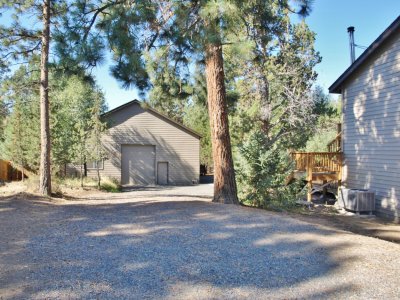 shop with gravel driveway