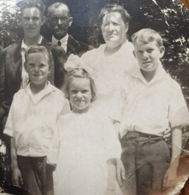 Front: Norman, Alice and Clarence Back: Roy, parents: Ole and Anna Haglund
