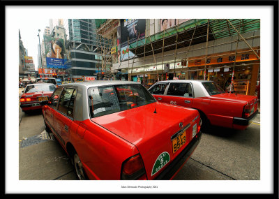 Red cabs and bamboo scaffoldings, Hong-Kong 2011