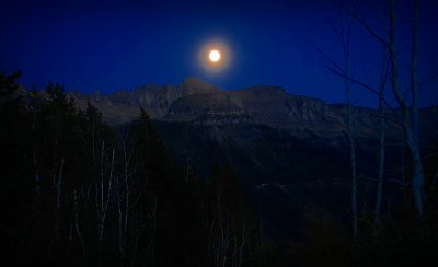 Harvest Moon Rising Over Rocky Mountains - Glacier National Park