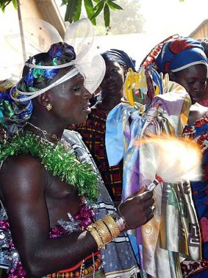 Korhogo. Poro junior dressed as a lady paying homage to the women during Poro celebration