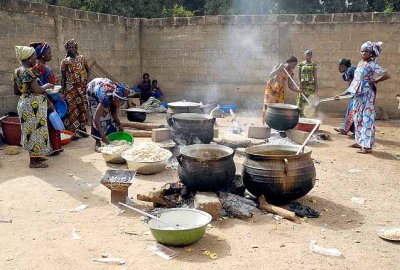 Korhogo. women cooking for the community during Poro celebration