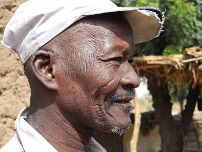 Scars identify this man as member of the Bobo tribe in Bana village, Burkina Faso