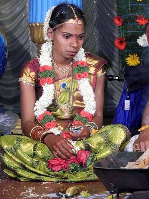 Newly wed. She knows the past, what will the future be like? Wedding ceremony in Karnataka, India