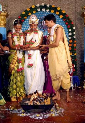 In front of the holy fire; Wedding ceremony in Karnataka, India