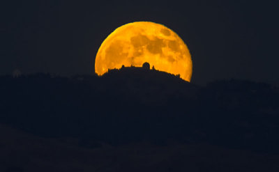 The Hunter's Moon Rising behind Lick Observatory