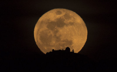 The Snow Moon Rising behind Lick Observatory