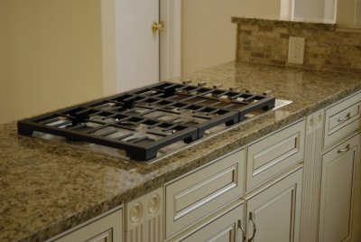 Granite counters and cook top are in