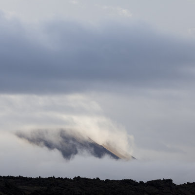 Búrfell peeping through the clouds