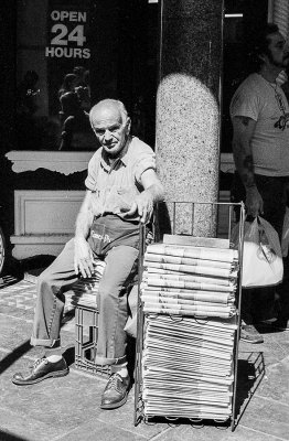 Newspaper salesman