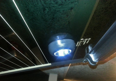 Small LED light attached with self adhesive tape