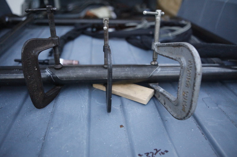 Rear seat bracket latch
