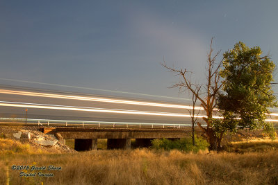 Streaking Westbound Coal Load At East Roggen, CO.jpg