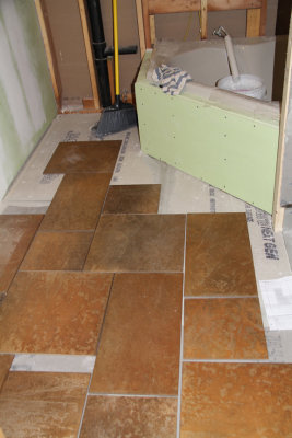 Master Floor Being Tiled_050413_web.jpg