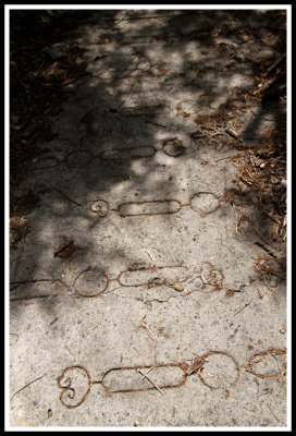 Old Sidewalk Imprints in Shadow