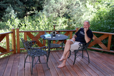 Randy Relaxing at House in Woods