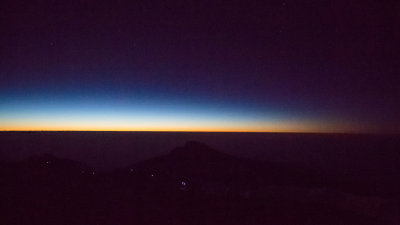 Stars above, headlamps below, just before dawn on the summit ridge.