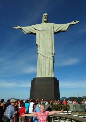 Posing in front of Christ the Redeemer statue