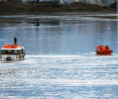 The tender rescuing the rescue boat from the snow bank