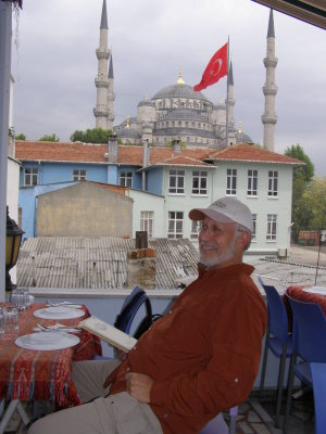Relaxing at lunch at a roof terrace restaurant, Blue Mosque in background.