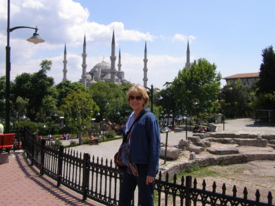 Ancient Roman ruins with Blue Mosque in the background