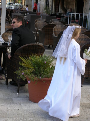 A girl in Cavtat getting ready for her first communion