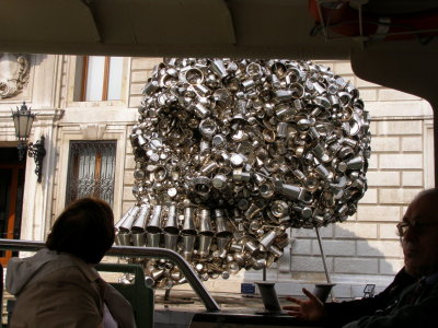 Skull sculpture in front of a modern art museum