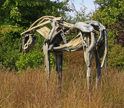 A BRASS HORSE (ONLY LOOKS LIKE WOOD)
