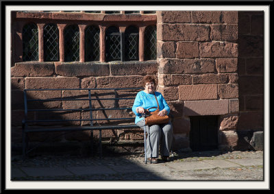 Adrienne with that lovely red sandstone